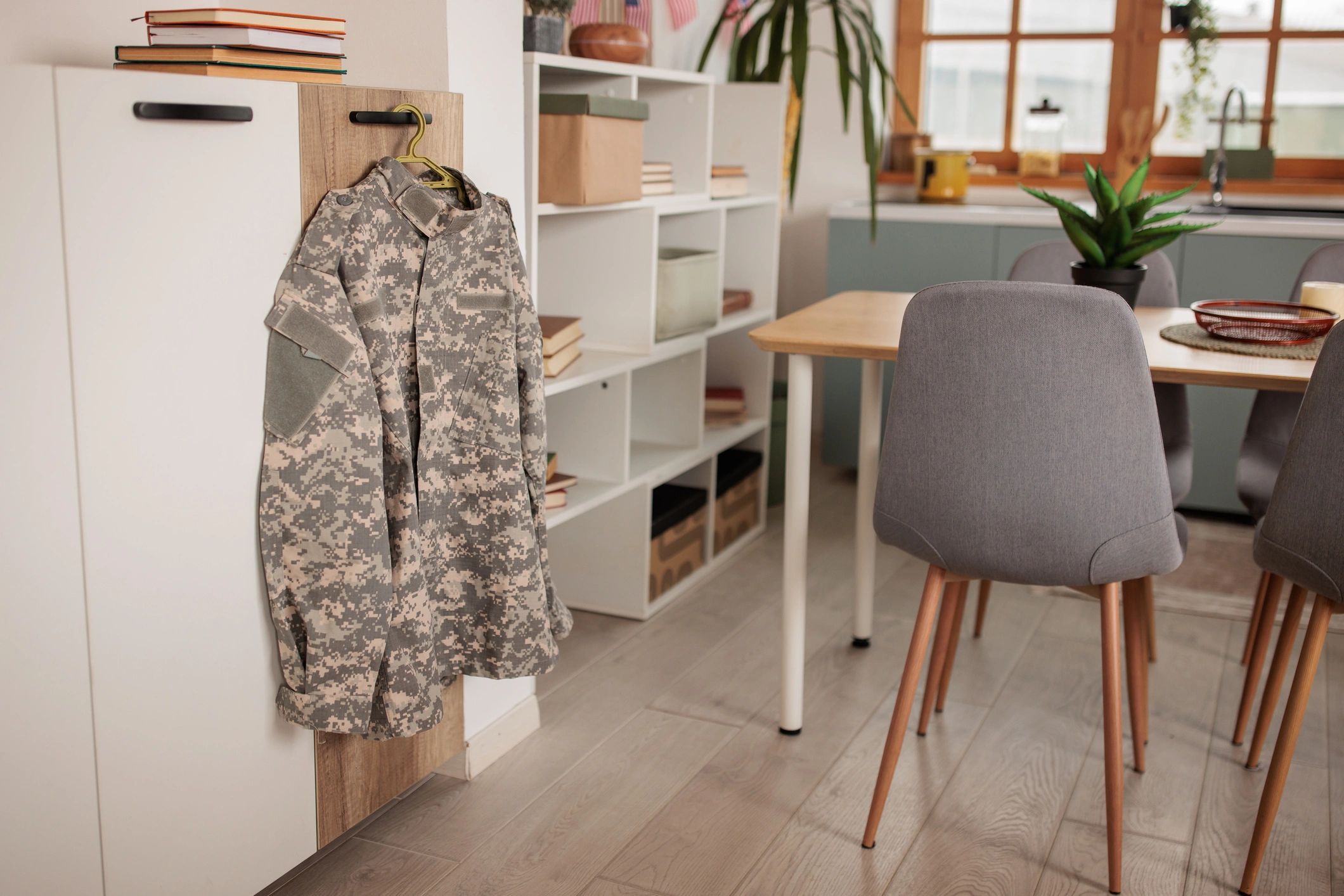 Military uniform hanging neatly indoors