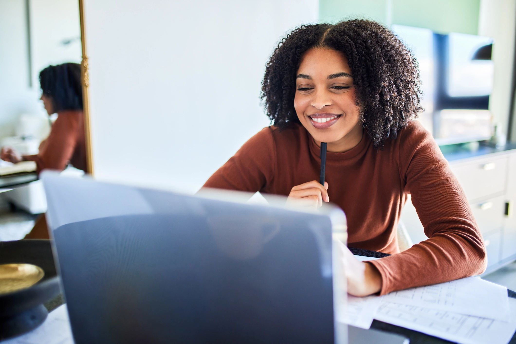 Person researching career options on a laptop